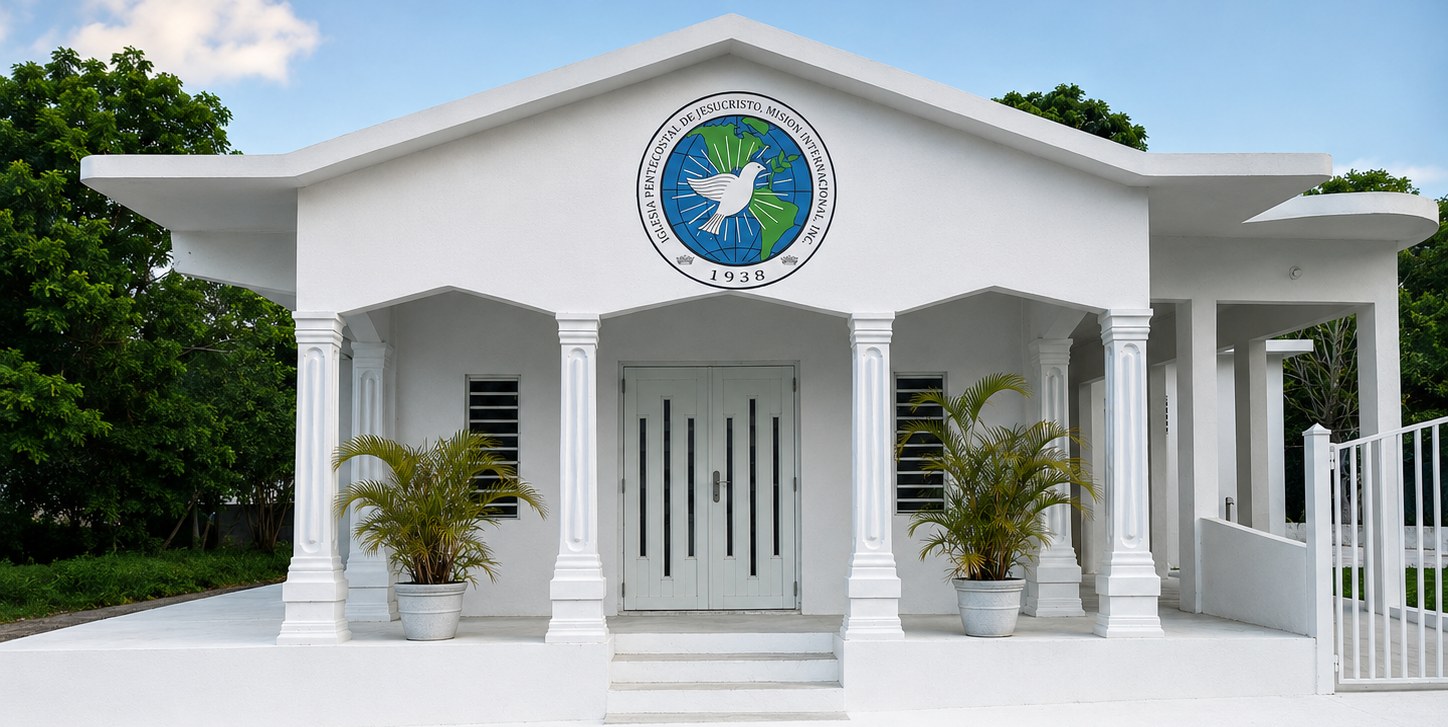 White church building with columns — Iglesia Pentecostal de Jesucristo, Misión Internacional, in Barriada Clark, Culebra, Puerto Rico