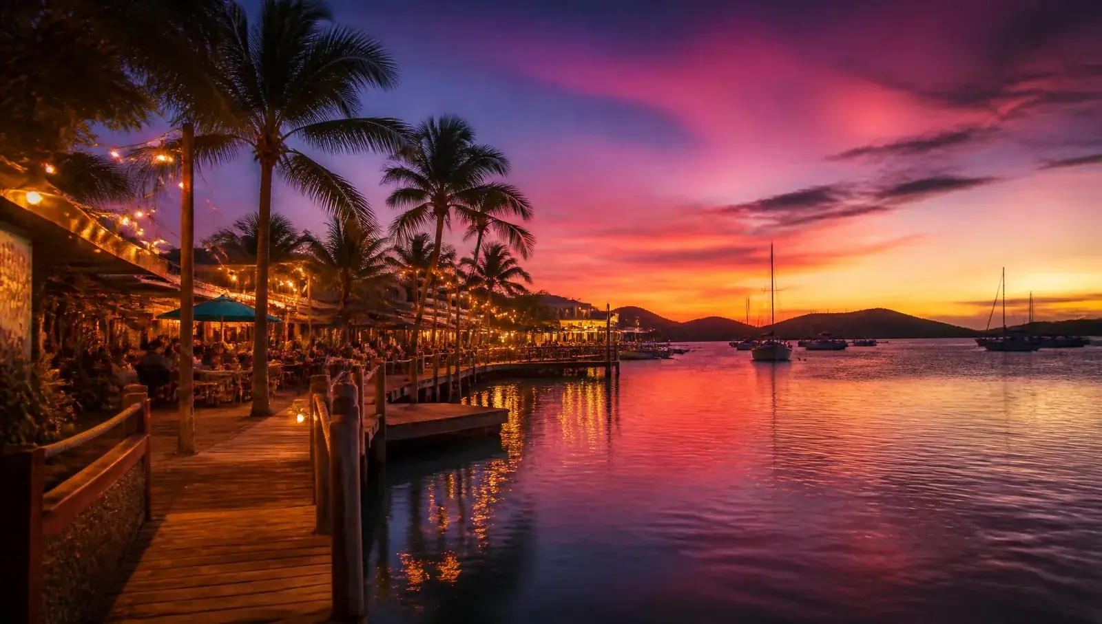 Culebra waterfront at sunset with palm trees and string lights