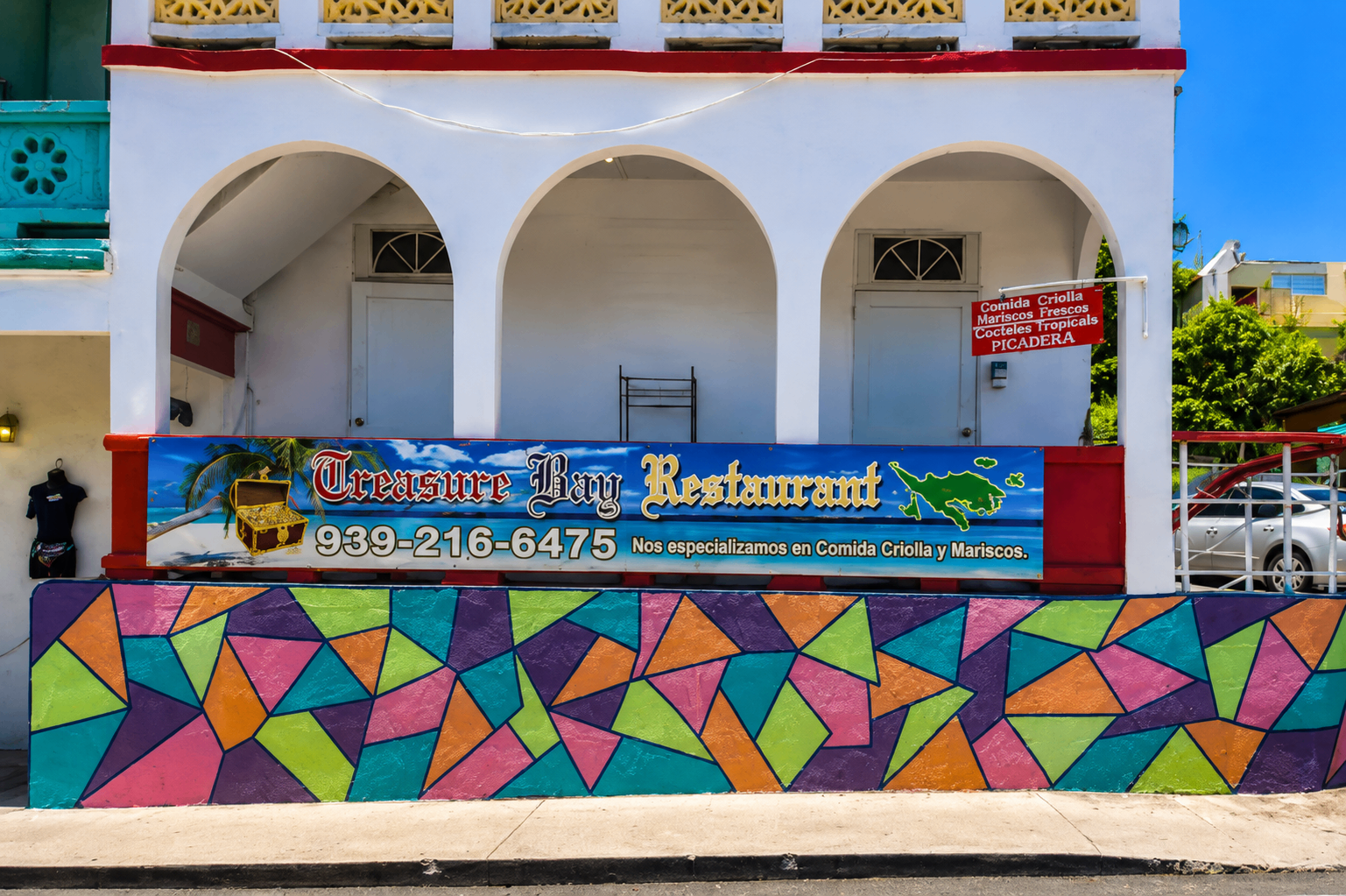 Treasure Bay Restaurant — colorful downtown Culebra storefront with pirate-treasure banner