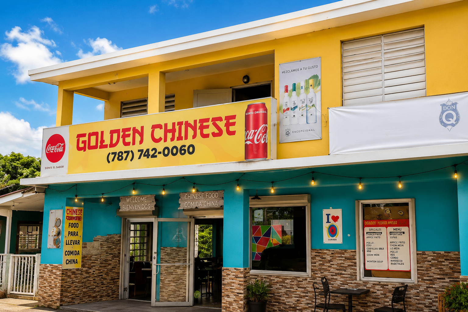 Golden Chinese storefront in downtown Culebra with bright yellow sign and turquoise walls