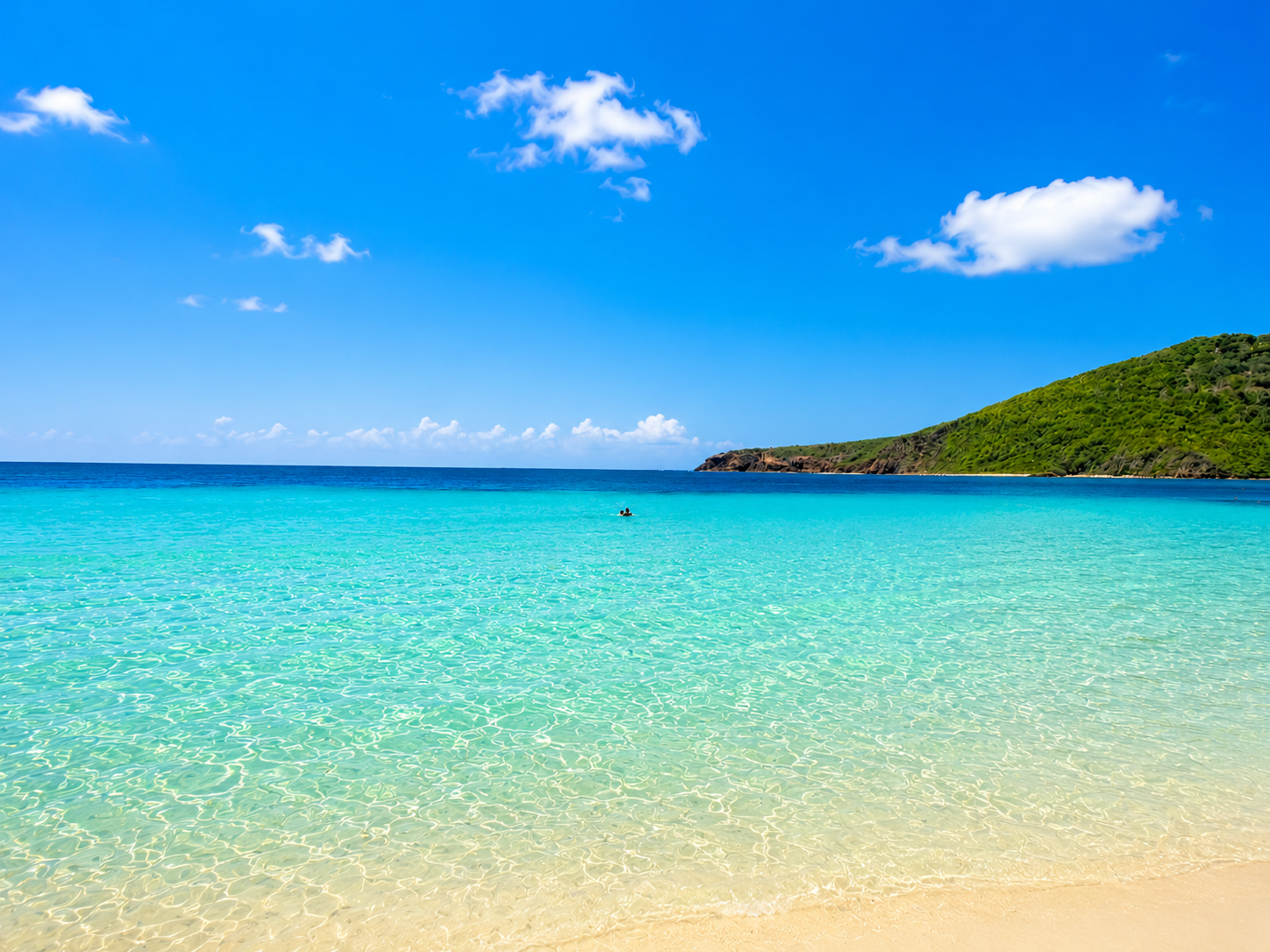 Gentle turquoise shallows perfect for families