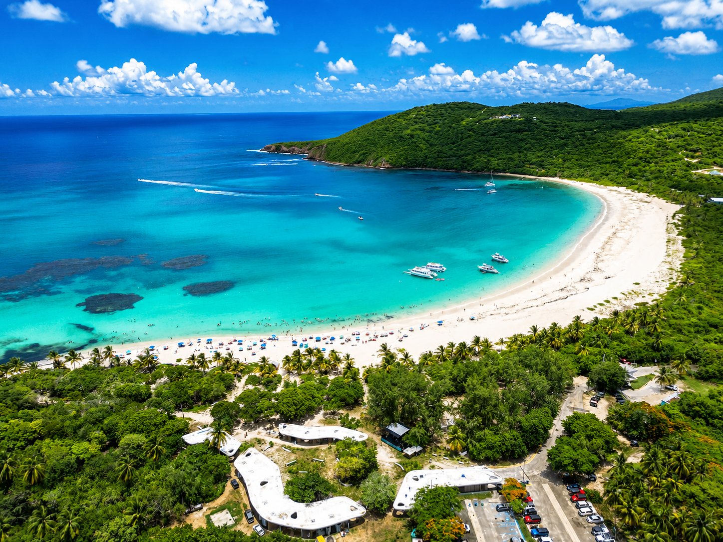 Turquoise water lapping the white sand of Flamenco Beach